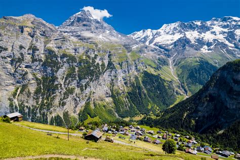 Swiss mountain village - This content was published on May 17, 2023 The looming collapse of the mountain above a Swiss village has put the inhabitants’ faith to the test. We spoke with the local Catholic priest.